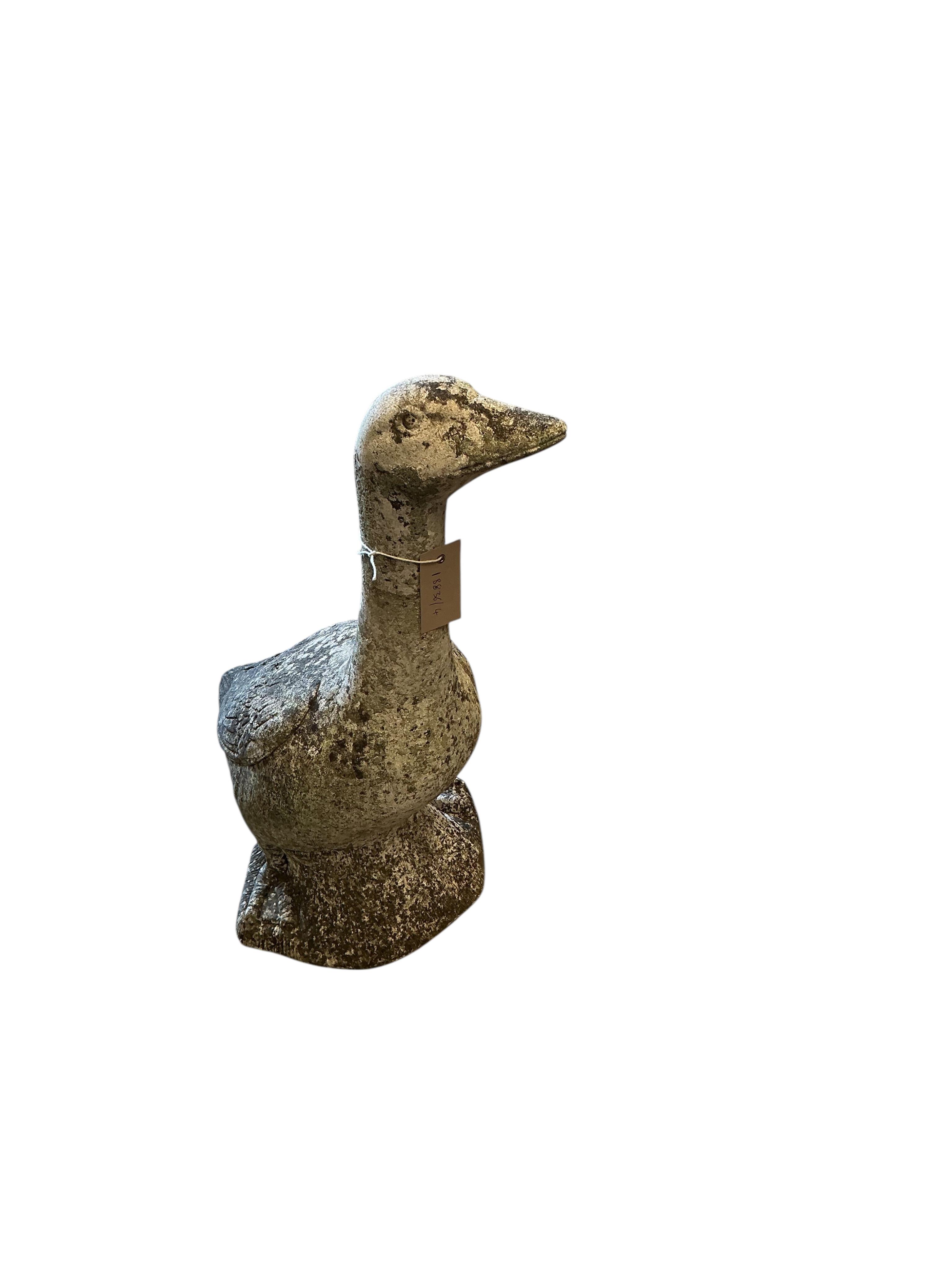 A reconstituted stone goose garden ornament, height 57cm